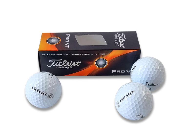3 Golfbälle, TRILUX Logo schwarz auf jedem Ball, Verpackung in schwarz/orange